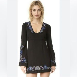 - Free People Holiday Folk
Mini Black Dress size 4